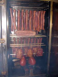 Bacon, holiday loaf, etc. being smoked